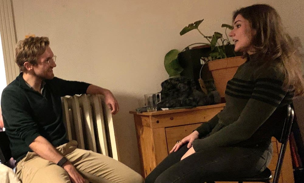 Two people talking at a Connect Bern event